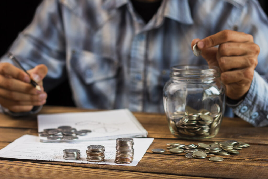 Retirement Planning 1 front view man counting saving